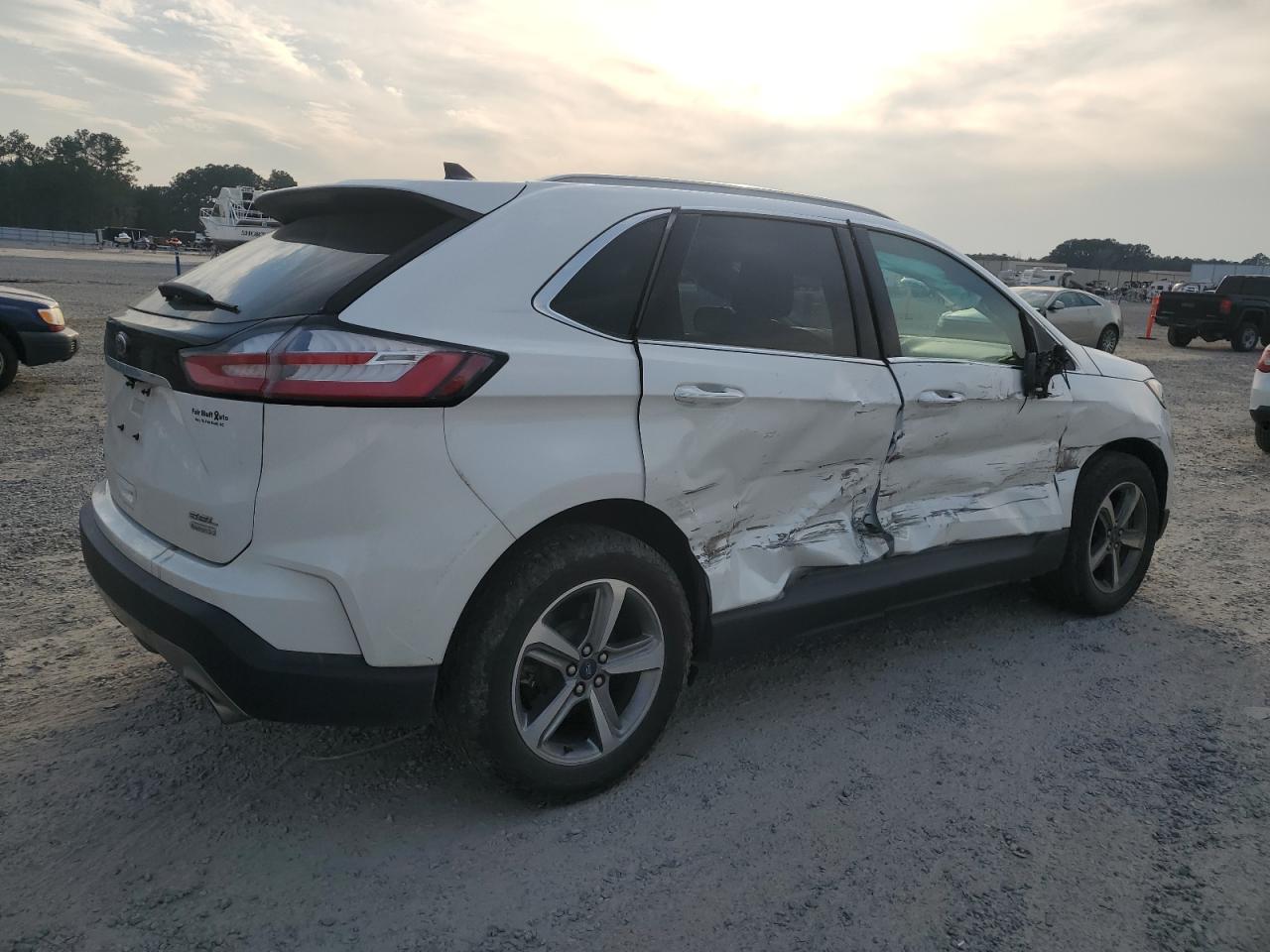 2020 Ford Edge VIN 2FMPK3J93LBB31350 Copart auction photo, side damage thumbnail 3