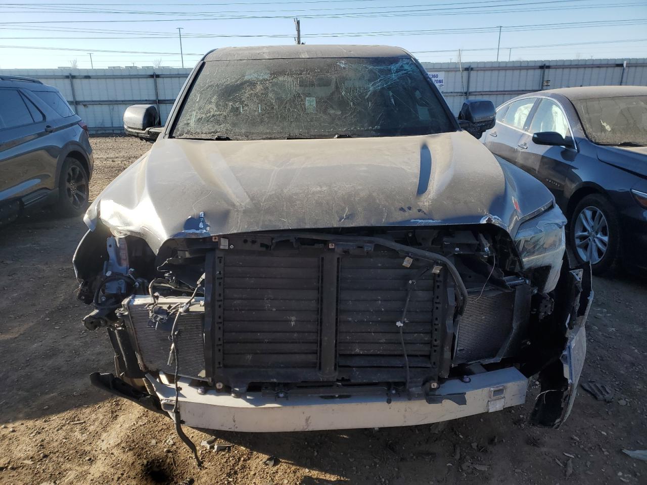 2023 Toyota Tundra VIN 5TFNA5DB6PX102836 Copart auction photo, front end / side damage thumbnail 5