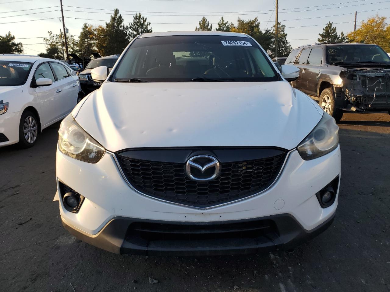 2015 Mazda CX-5 VIN JM3KE4DY1F0550356 Copart auction photo, hail / front end damage thumbnail 5