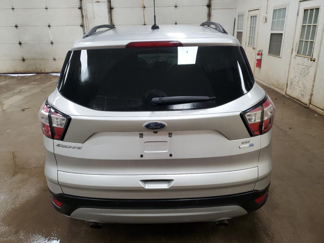 2017 Ford Escape VIN 1FMCU9G98HUD52401 Copart auction photo, front end / minor dent/scratches damage thumbnail 6