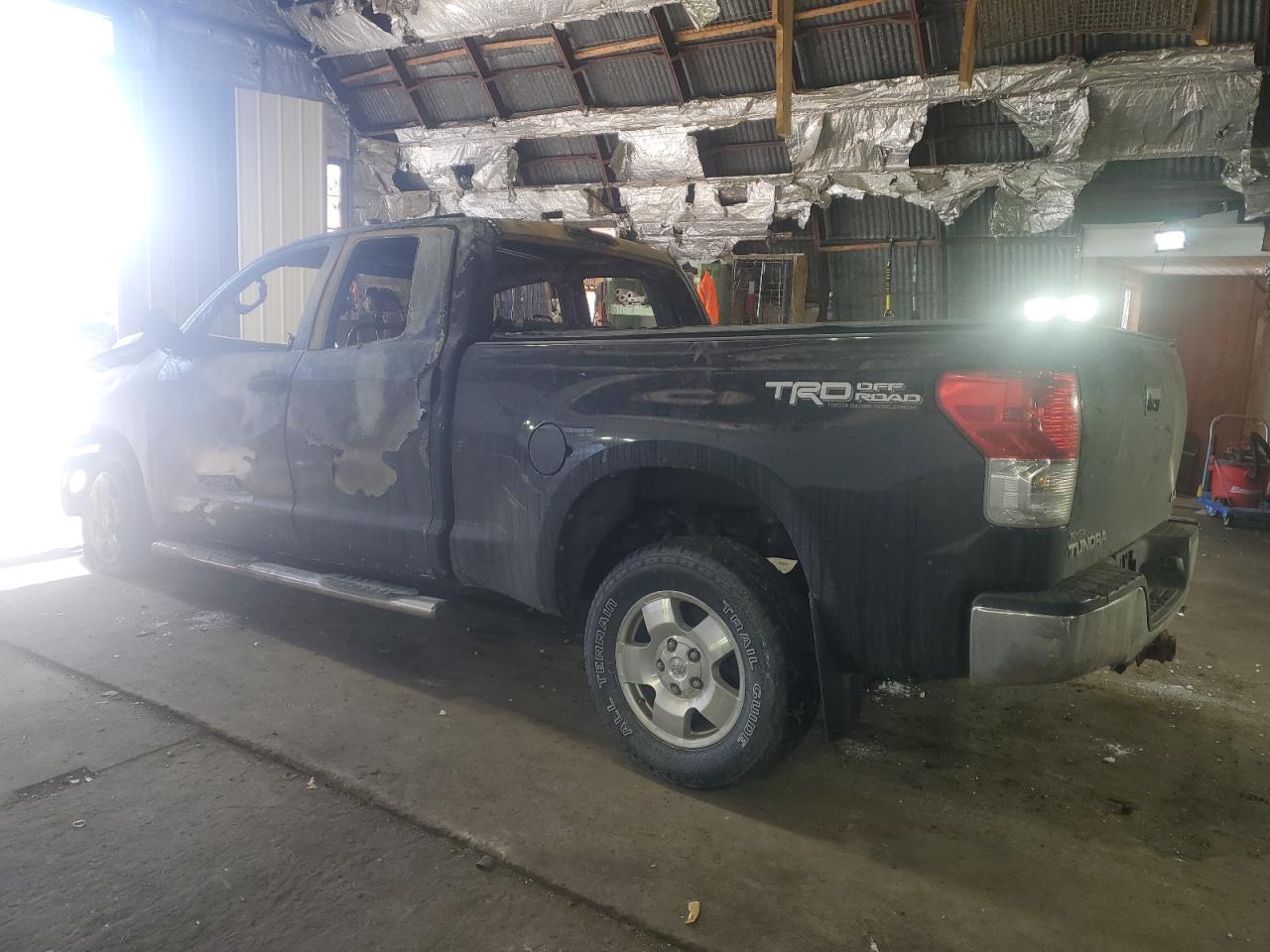 2012 Toyota Tundra VIN 5TFUY5F13CX242574 Copart auction photo, burn - engine damage thumbnail 2