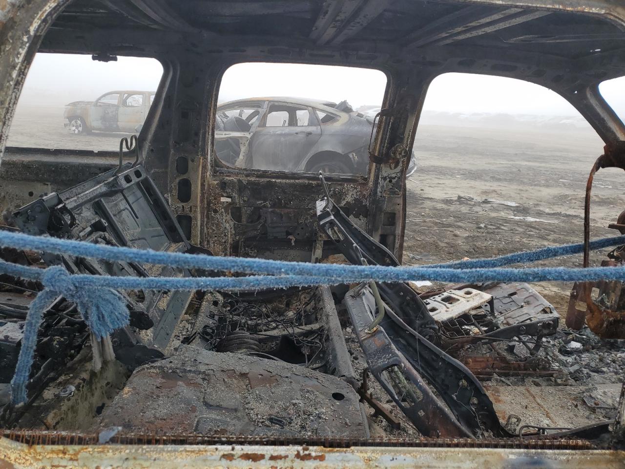 2011 Chevrolet Suburban VIN 1GNSKHE36BR368015 Copart auction photo, burn damage thumbnail 11