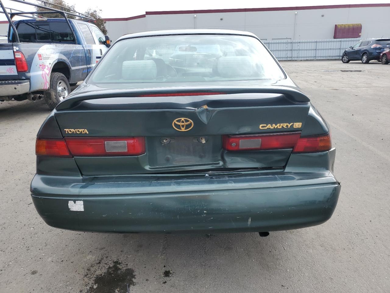 1999 Toyota Camry VIN 4T1BG22K9XU560175 Copart auction photo, rear end damage thumbnail 6
