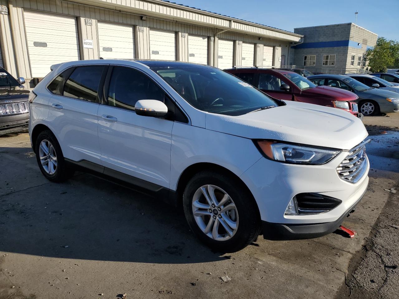 2020 Ford Edge VIN 2FMPK3J99LBB31885 Copart auction photo, front end / side damage thumbnail 4