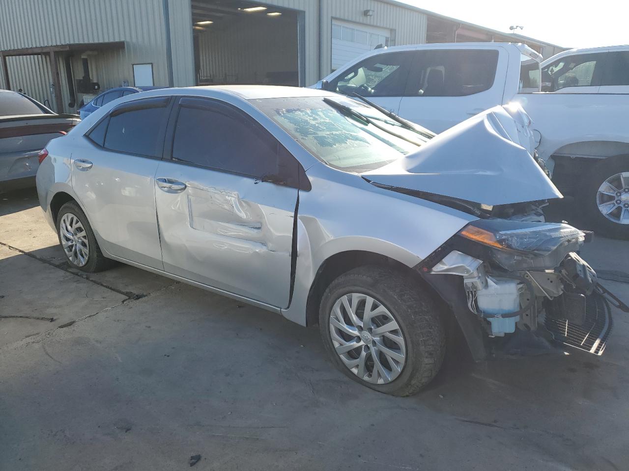 2018 Toyota Corolla VIN 5YFBURHE9JP787782 Copart auction photo, front end / hail damage thumbnail 4