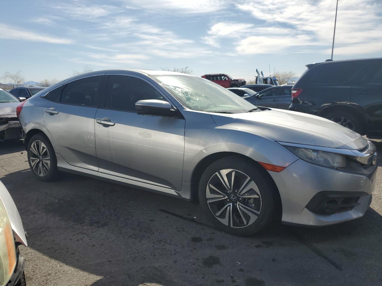 2017 Honda Civic VIN 19XFC1F36HE022855 Copart auction photo, rear end damage thumbnail 4