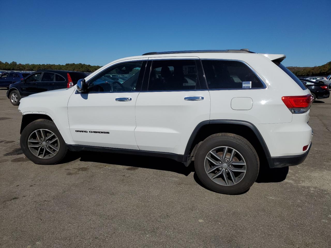 2017 Jeep Grand Cherokee VIN 1C4RJFBG2HC835366 Copart auction photo, front end / side damage thumbnail 2