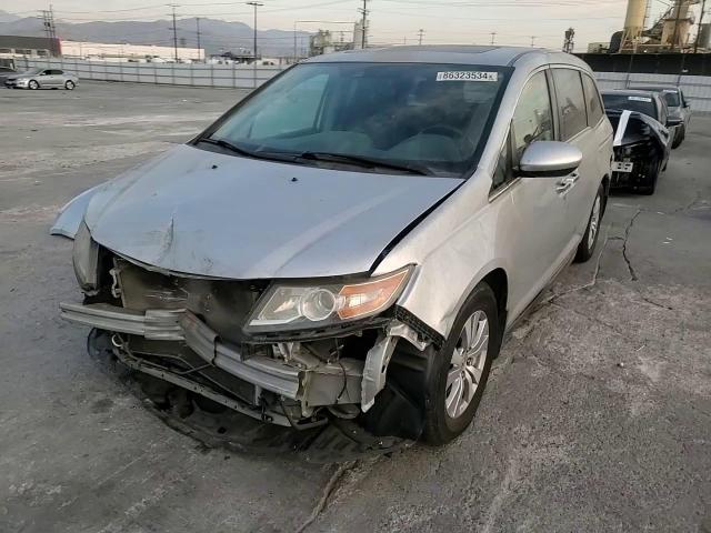 2015 Honda Odyssey VIN 5FNRL5H69FB108972 Copart auction photo, all over damage thumbnail 11