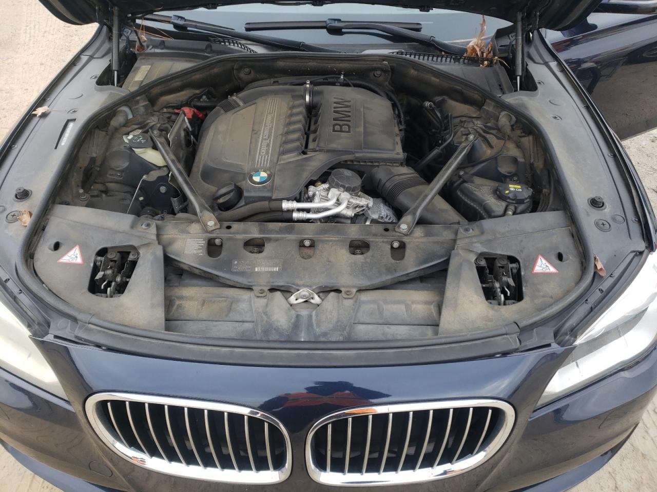 2013 BMW 7er VIN WBAYE4C52DD136774 Copart auction photo, mechanical / minor dent/scratches damage thumbnail 11