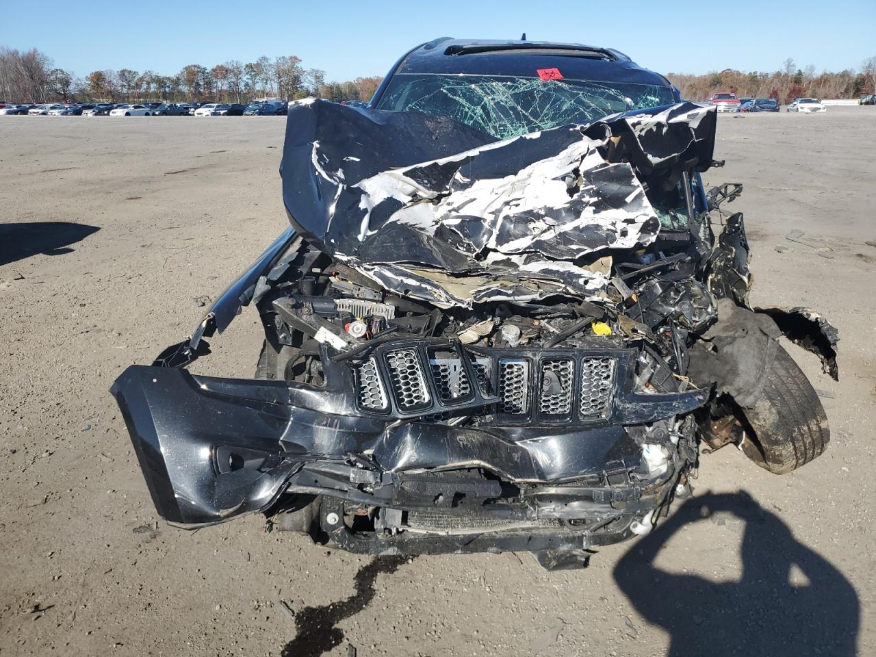 2015 Jeep Grand Cherokee VIN 1C4RJFAG0FC134873 Copart auction photo, front end / side damage thumbnail 9