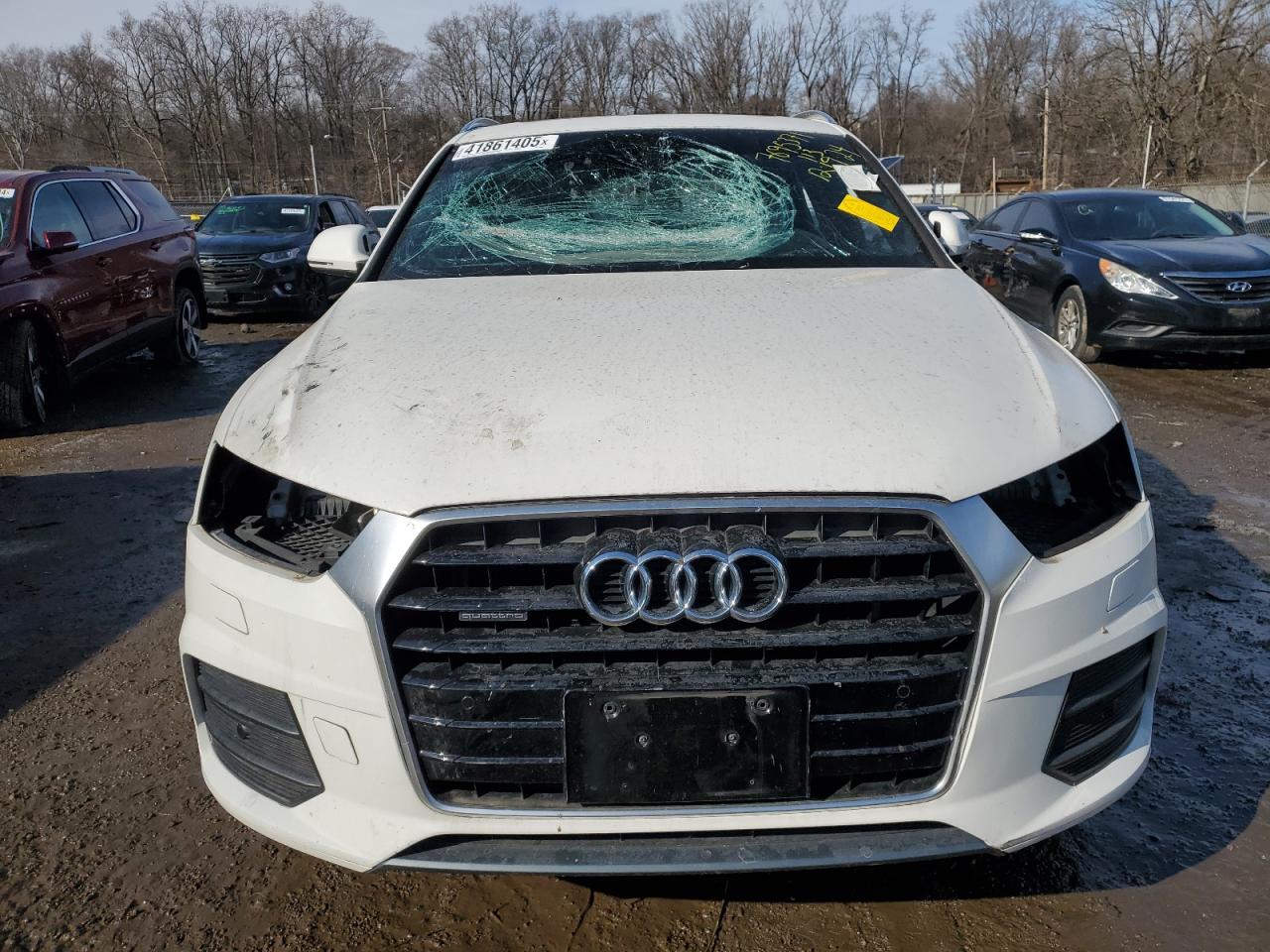 2017 Audi Q3 VIN WA1JCCFS8HR006944 Copart auction photo, vandalism damage thumbnail 5