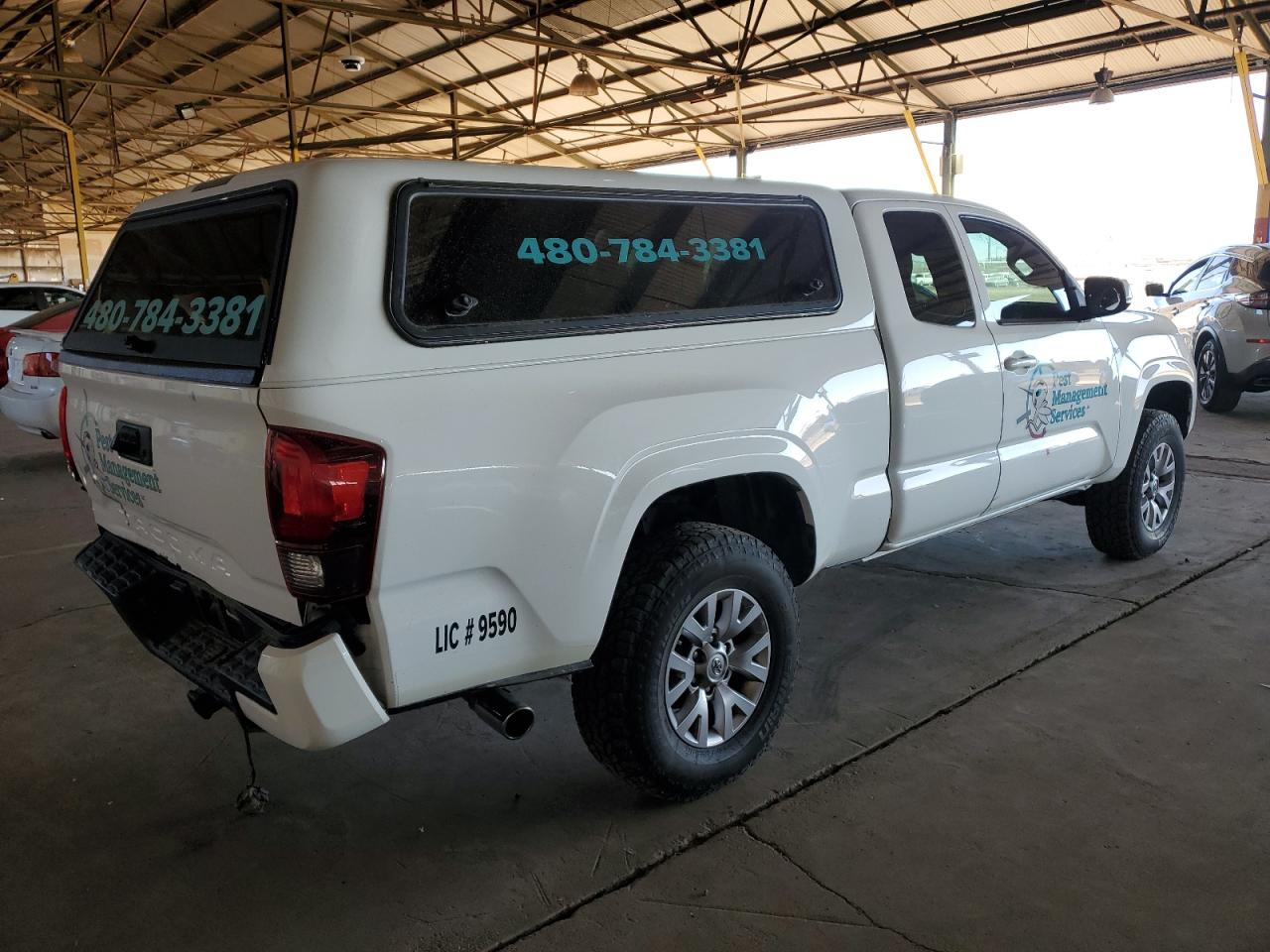 2018 Toyota Tacoma VIN 5TFRX5GN2JX111711 Copart auction photo, rear end / minor dent/scratches damage thumbnail 3