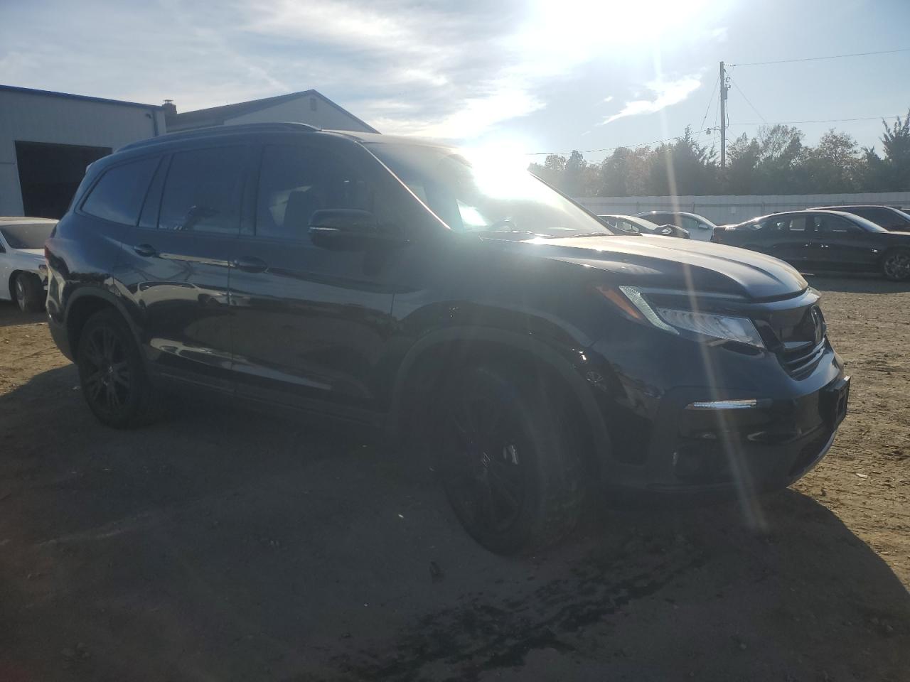 2022 Honda Pilot VIN 5FNYF6H76NB000213 Copart auction photo, all over damage thumbnail 4