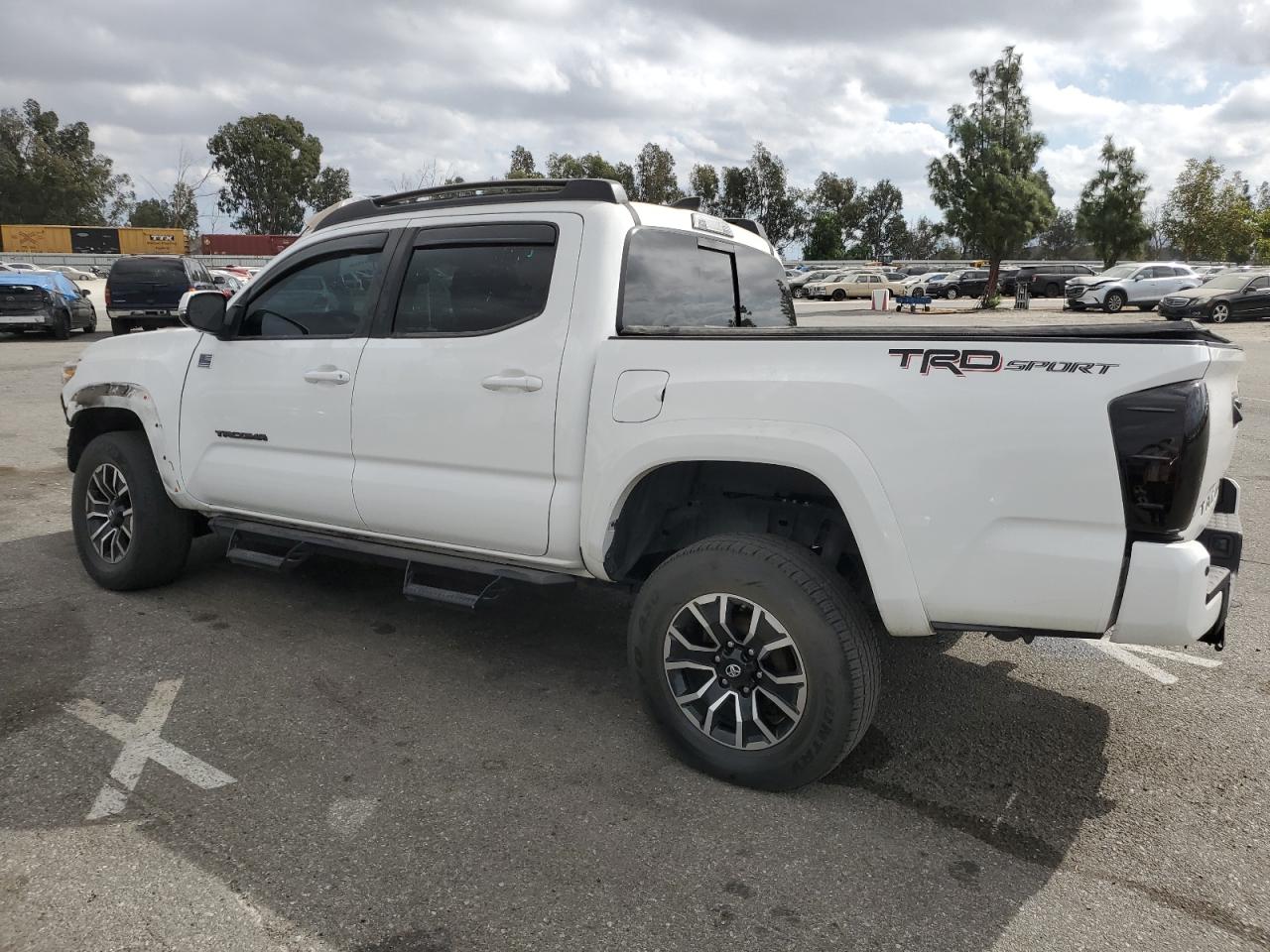 2020 Toyota Tacoma VIN 3TMAZ5CN5LM140058 Copart auction photo, front end / side damage thumbnail 2