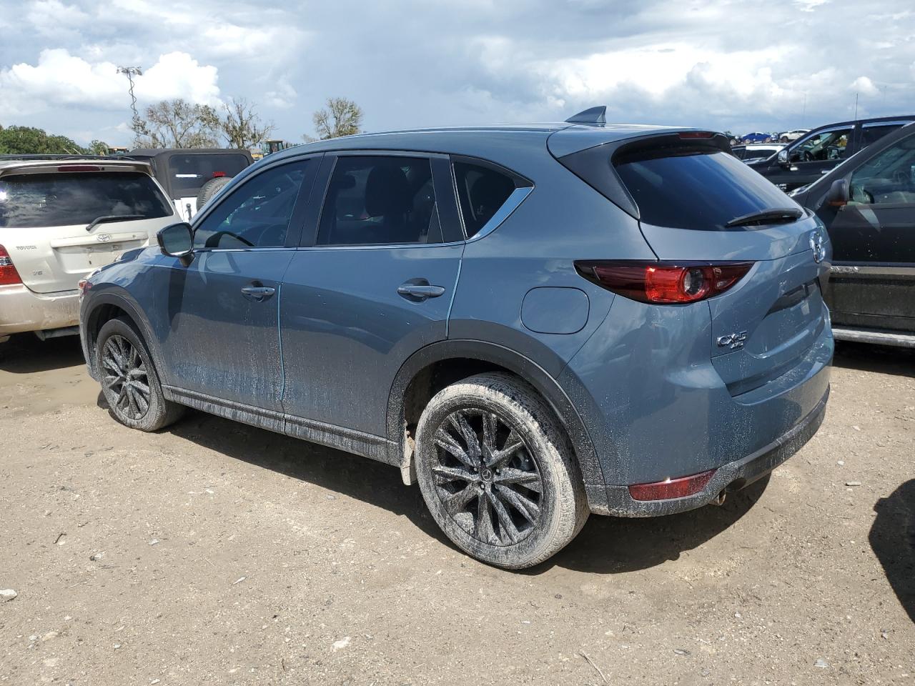 2021 Mazda CX-5 VIN JM3KFBCYXM0454614 Copart auction photo, water/flood damage thumbnail 2