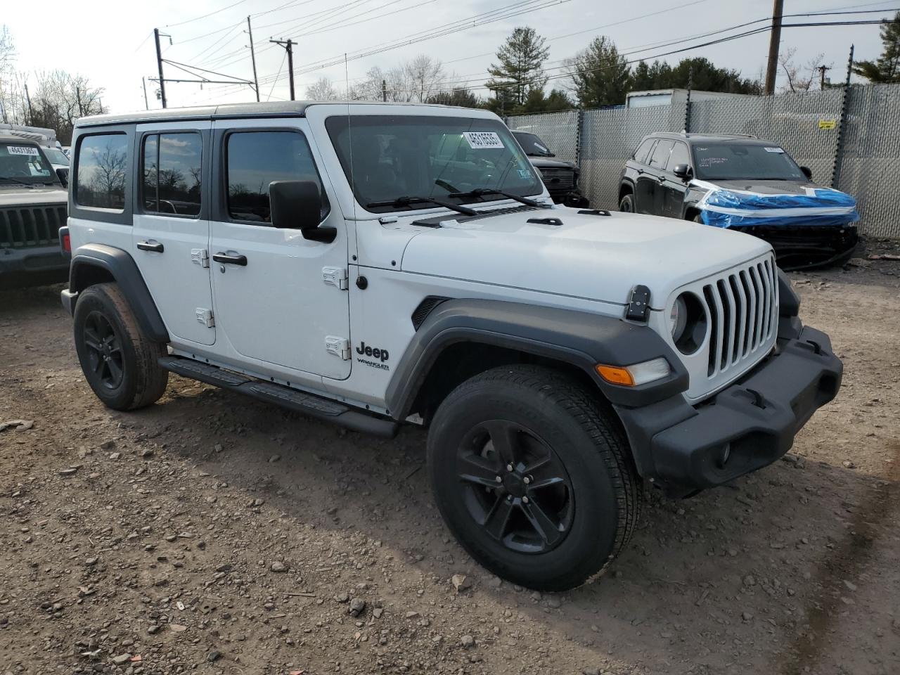 2021 Jeep Wrangler VIN 1C4HJXDN6MW770964 Copart auction photo, rear end / side damage thumbnail 4