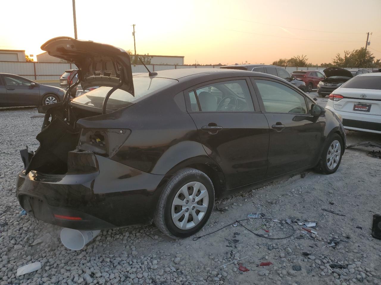 2012 KIA Rio VIN KNADM4A38C6067319 Copart auction photo, rear end / minor dent/scratches damage thumbnail 3
