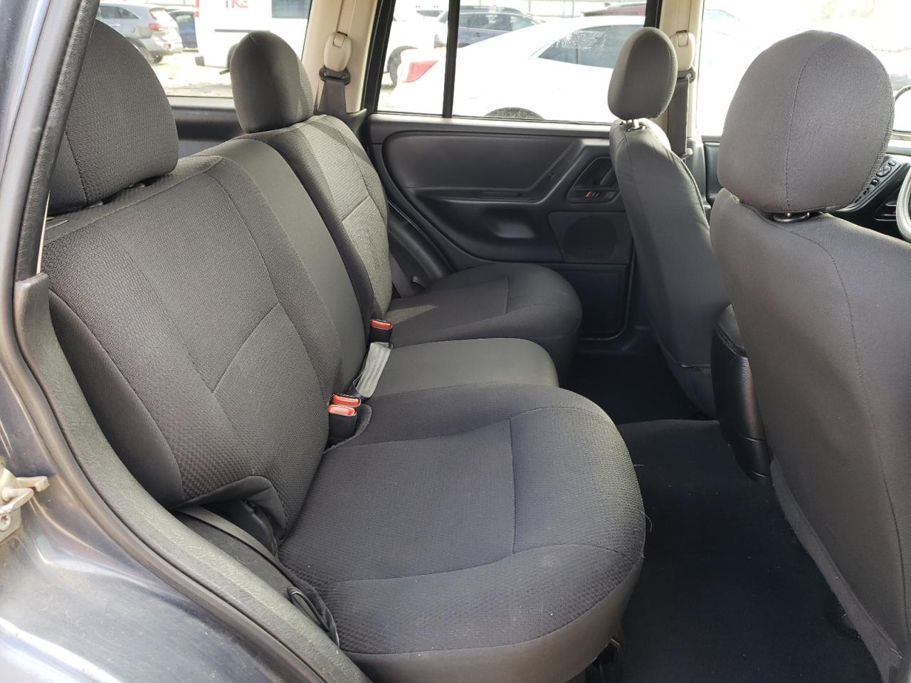 2002 Jeep Grand Cherokee VIN 1J4GW48S02C222835 Copart auction photo, all over damage thumbnail 12