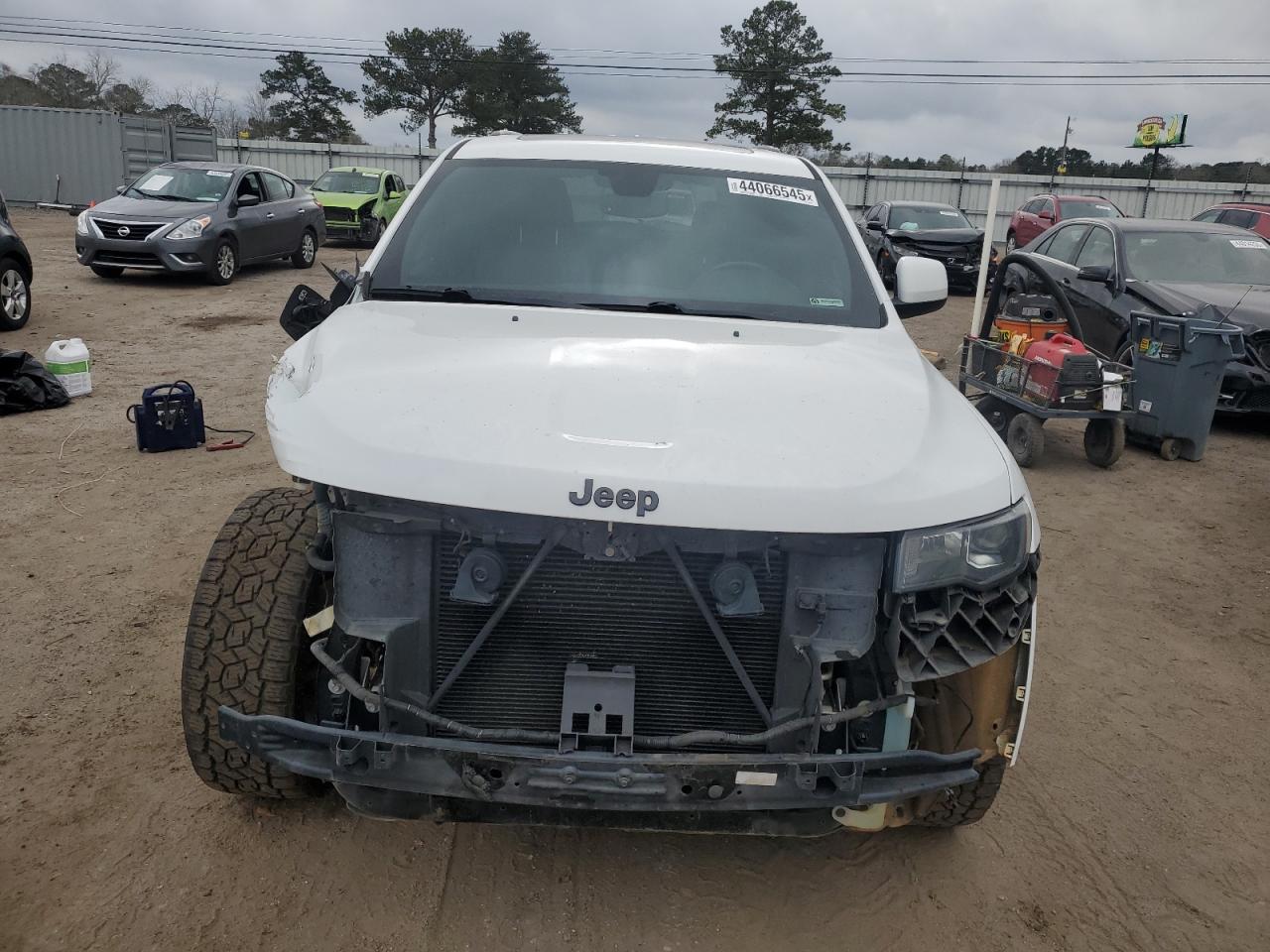 2018 Jeep Grand Cherokee VIN 1C4RJEAG6JC485273 Copart auction photo, side / front end damage thumbnail 5