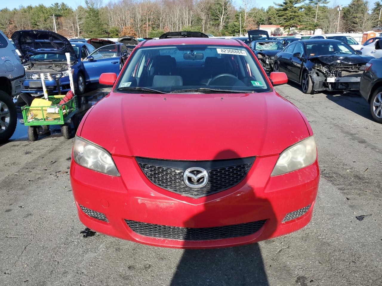 2005 Mazda 3 VIN JM1BK12F651332214 Copart auction photo, side damage thumbnail 5