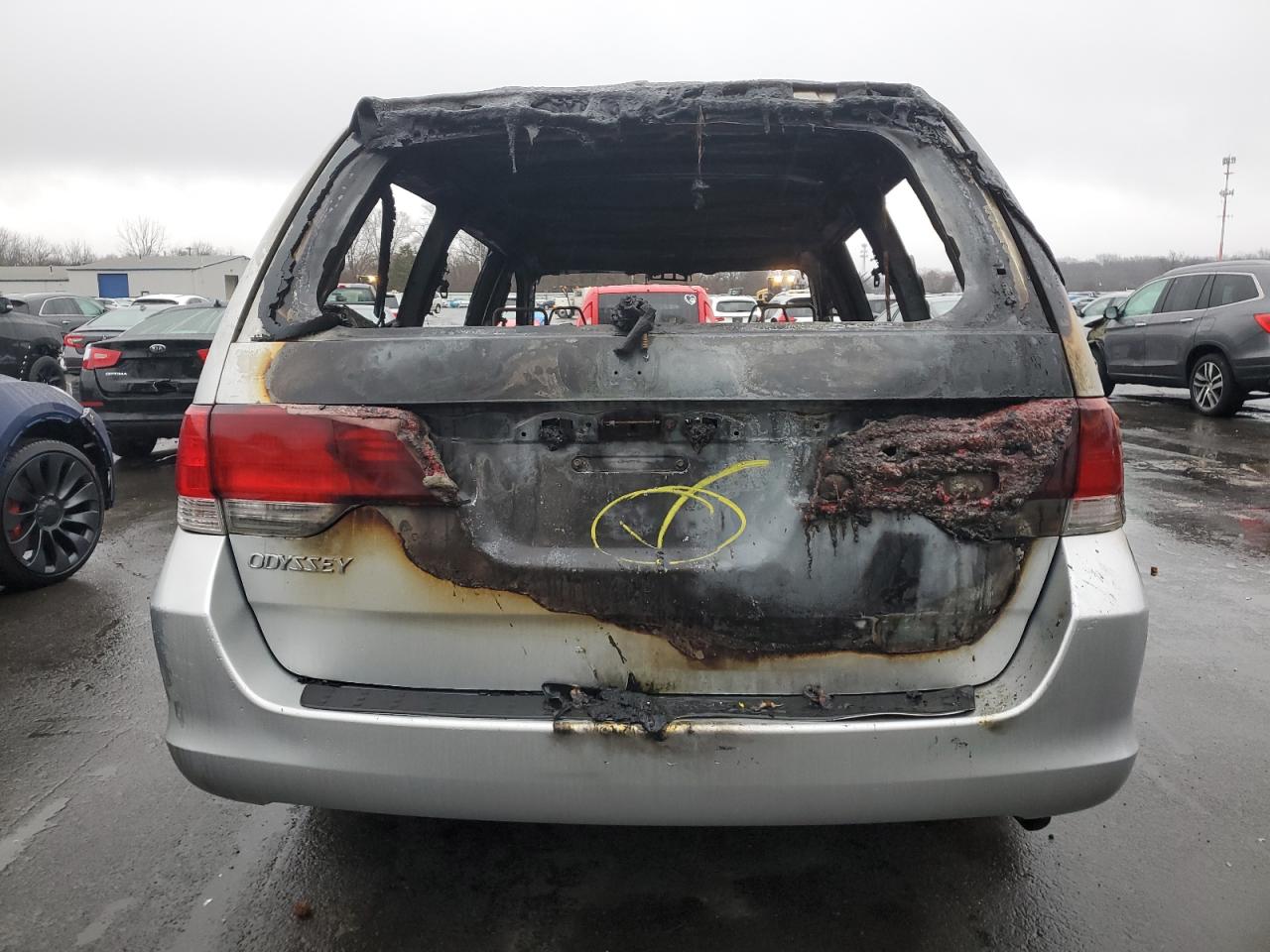 2010 Honda Odyssey VIN 5FNRL3H28AB015709 Copart auction photo, burn damage thumbnail 6