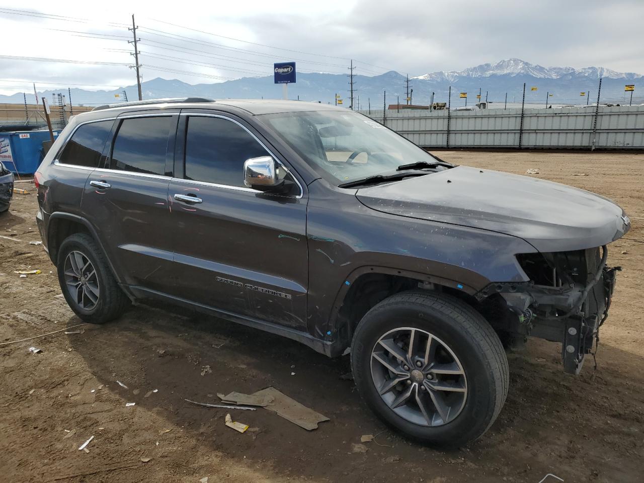 2018 Jeep Grand Cherokee VIN 1C4RJFBG5JC241084 Copart auction photo, front end / side damage thumbnail 4