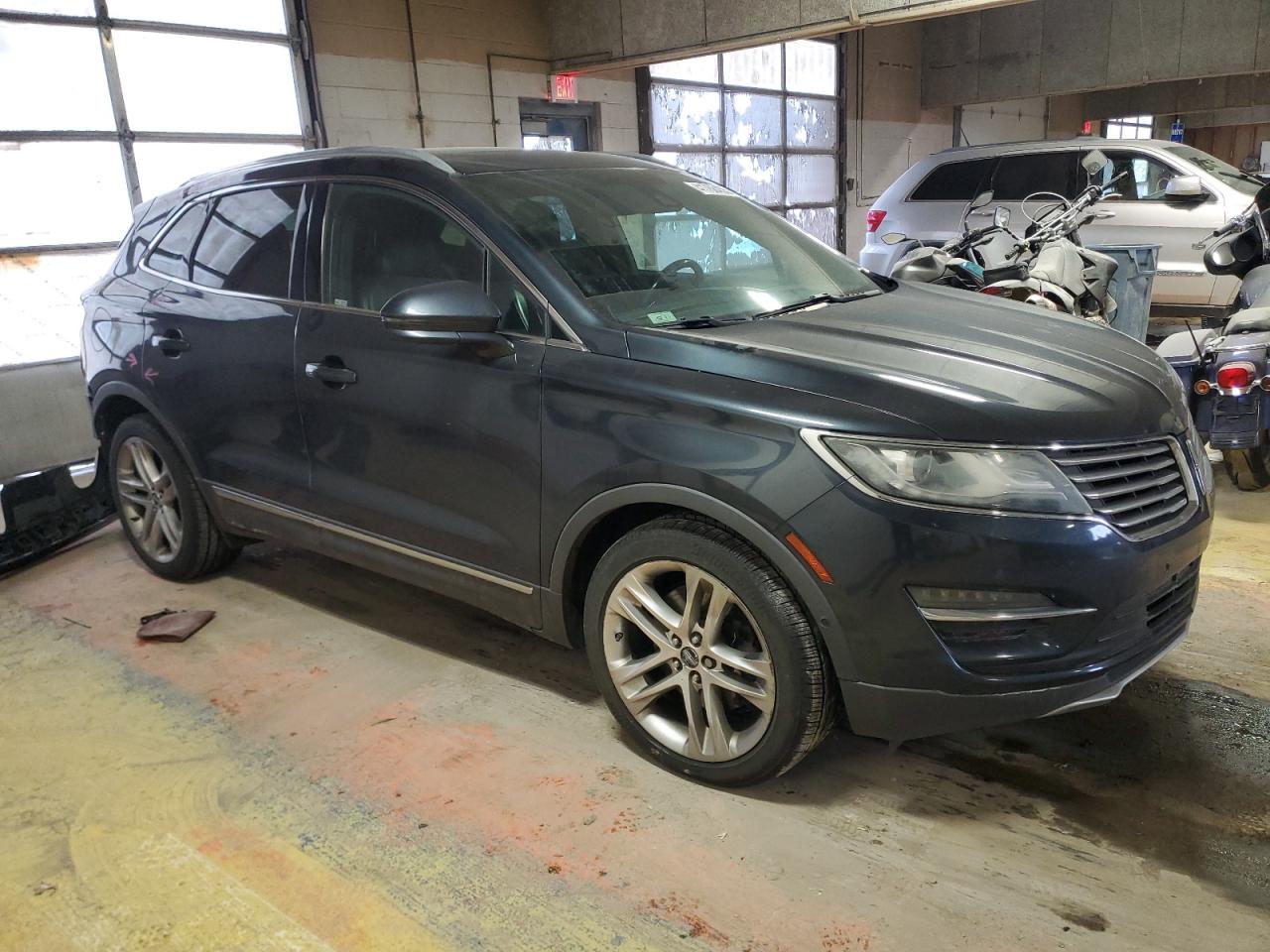 2015 Lincoln MKZ VIN 5LMTJ2AH0FUJ05397 Copart auction photo, rear end / minor dent/scratches damage thumbnail 4