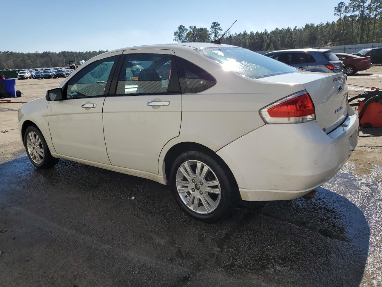 2010 Ford Focus VIN 1FAHP3HN4AW261068 Copart auction photo, side damage thumbnail 2