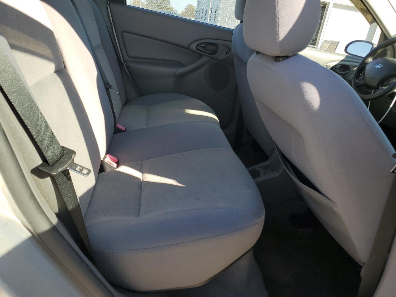 2004 Ford Focus VIN 1FAFP38Z04W126765 Copart auction photo, side / minor dent/scratches damage thumbnail 11