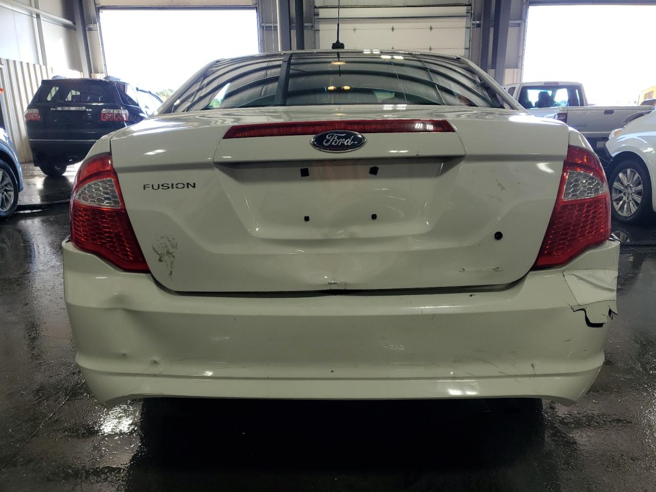 2012 Ford Fusion VIN 3FAHP0GA3CR231546 Copart auction photo, front end / rear end damage thumbnail 6