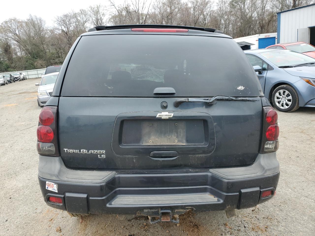 2005 Chevrolet TrailBlazer VIN 1GNDT13SX52303785 Copart auction photo, all over damage thumbnail 6