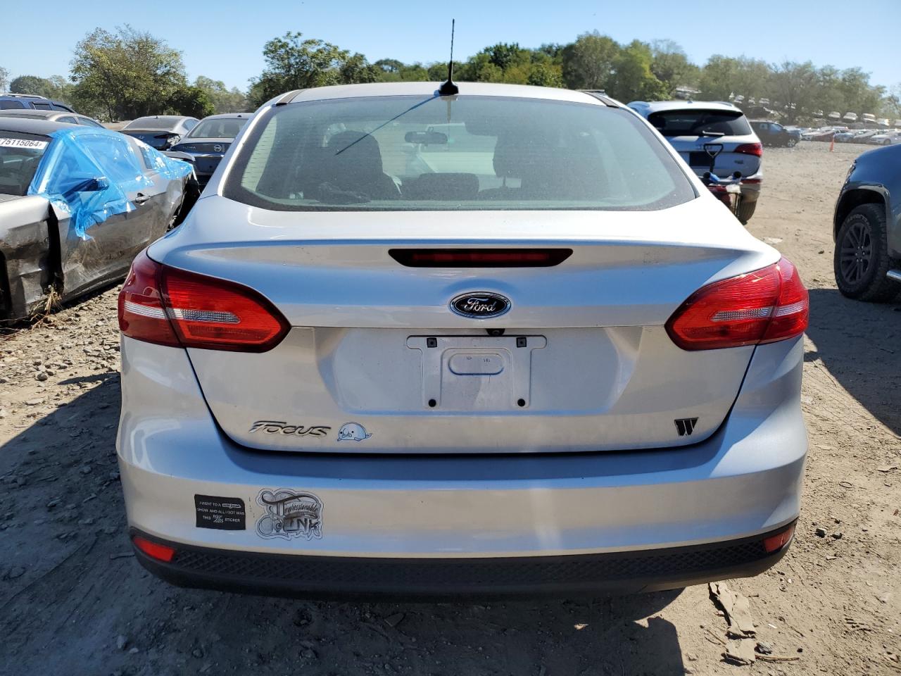 2018 Ford Focus VIN 1FADP3E2XJL320750 Copart auction photo, side / minor dent/scratches damage thumbnail 6