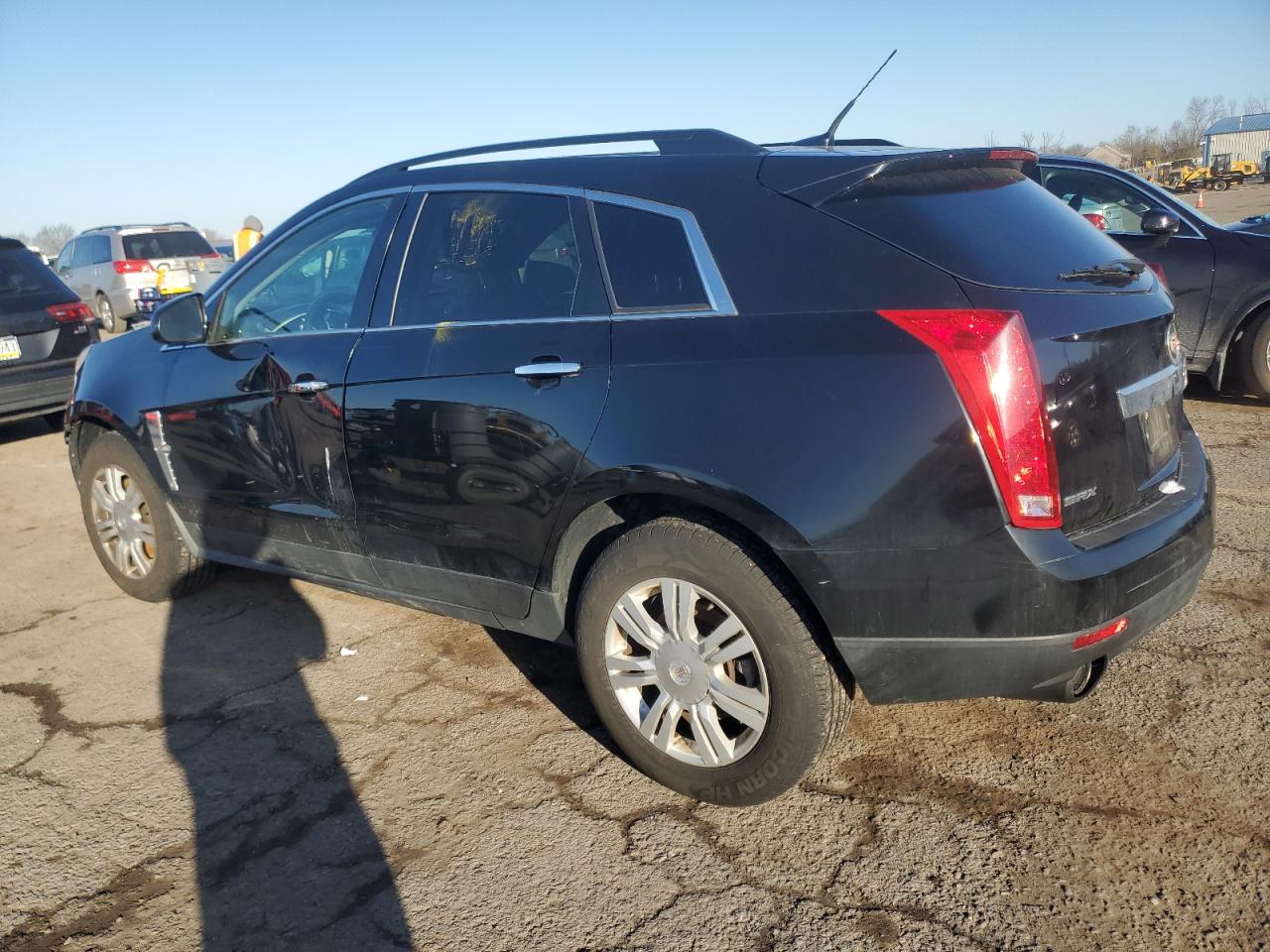 2012 Cadillac SRX VIN 3GYFNGE39CS657443 Copart auction photo, front end / side damage thumbnail 2
