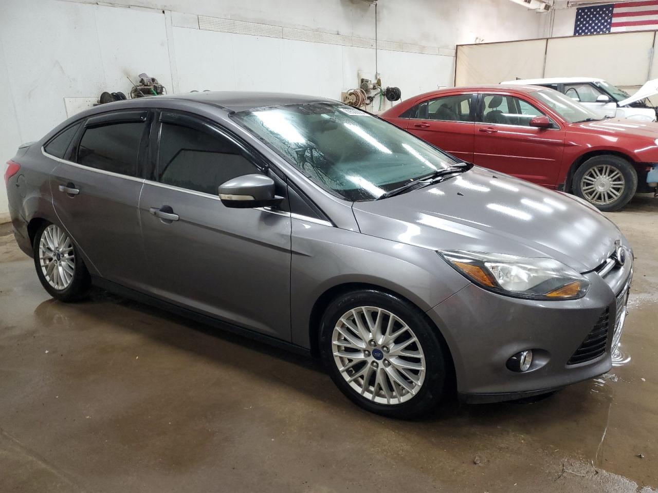2014 Ford Focus VIN 1FADP3J29EL137061 Copart auction photo, rear end / minor dent/scratches damage thumbnail 4