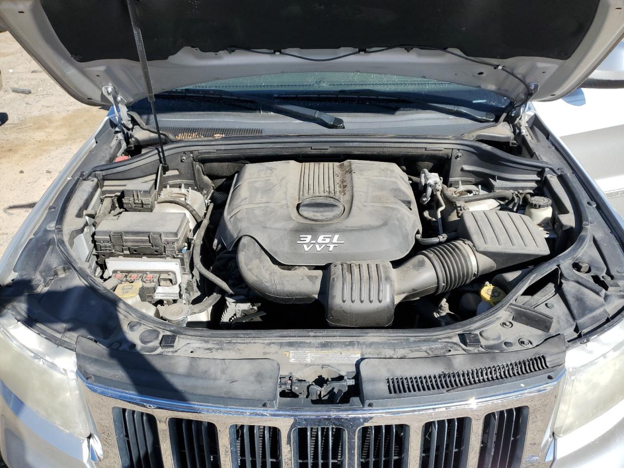 2012 Jeep Grand Cherokee VIN 1C4RJFAGXCC239657 Copart auction photo, rear end damage thumbnail 12