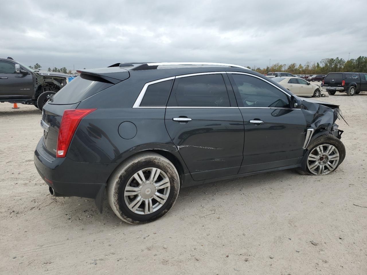 2015 Cadillac SRX VIN 3GYFNBE31FS612617 Copart auction photo, all over damage thumbnail 3