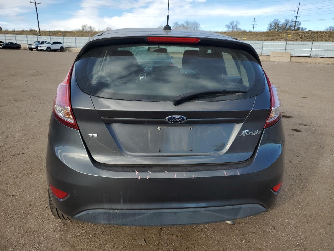 2016 Ford Fiesta VIN 3FADP4EJ7GM199650 Copart auction photo, rear end / hail damage thumbnail 6