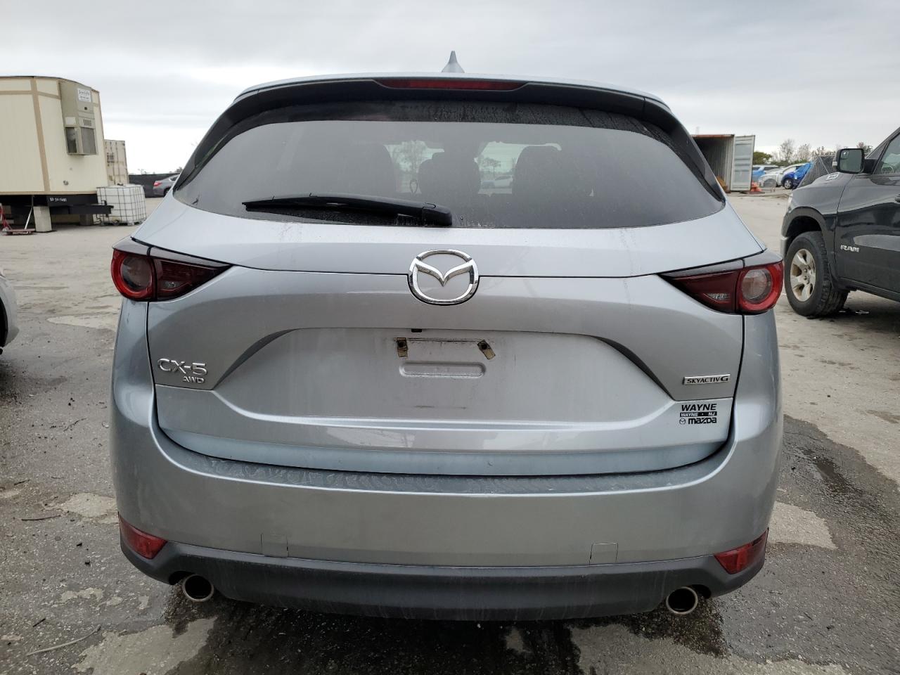 2020 Mazda CX-5 VIN JM3KFBCM7L0735703 Copart auction photo, side / front end damage thumbnail 6