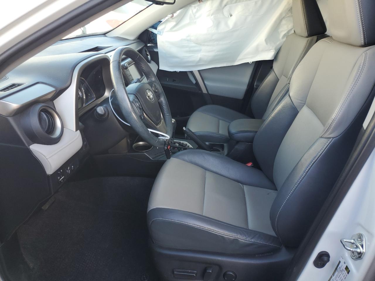 2015 Toyota RAV 4 VIN 2T3YFREV2FW207617 Copart auction photo, side / rear end damage thumbnail 7