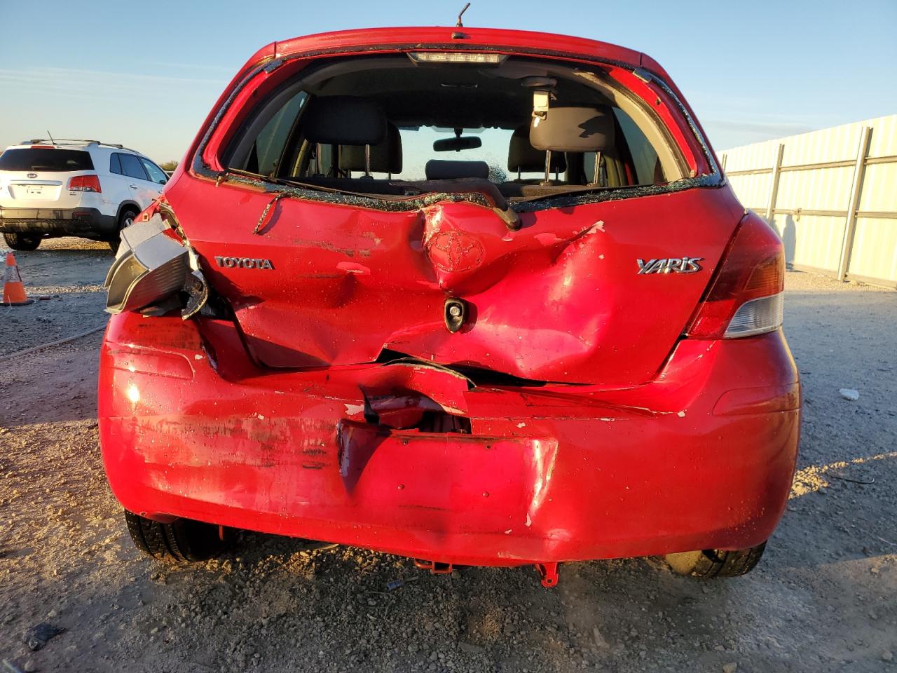 2009 Toyota Yaris VIN JTDKT903595262840 Copart auction photo, rear end / front end damage thumbnail 6