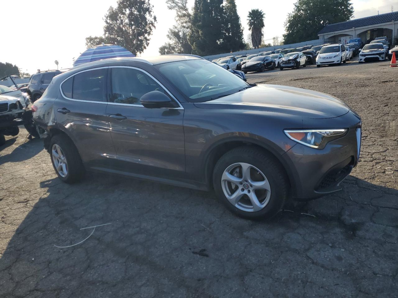 2019 Alfa Romeo Stelvio VIN ZASPAJAN9K7C37194 Copart auction photo, rear end / minor dent/scratches damage thumbnail 4