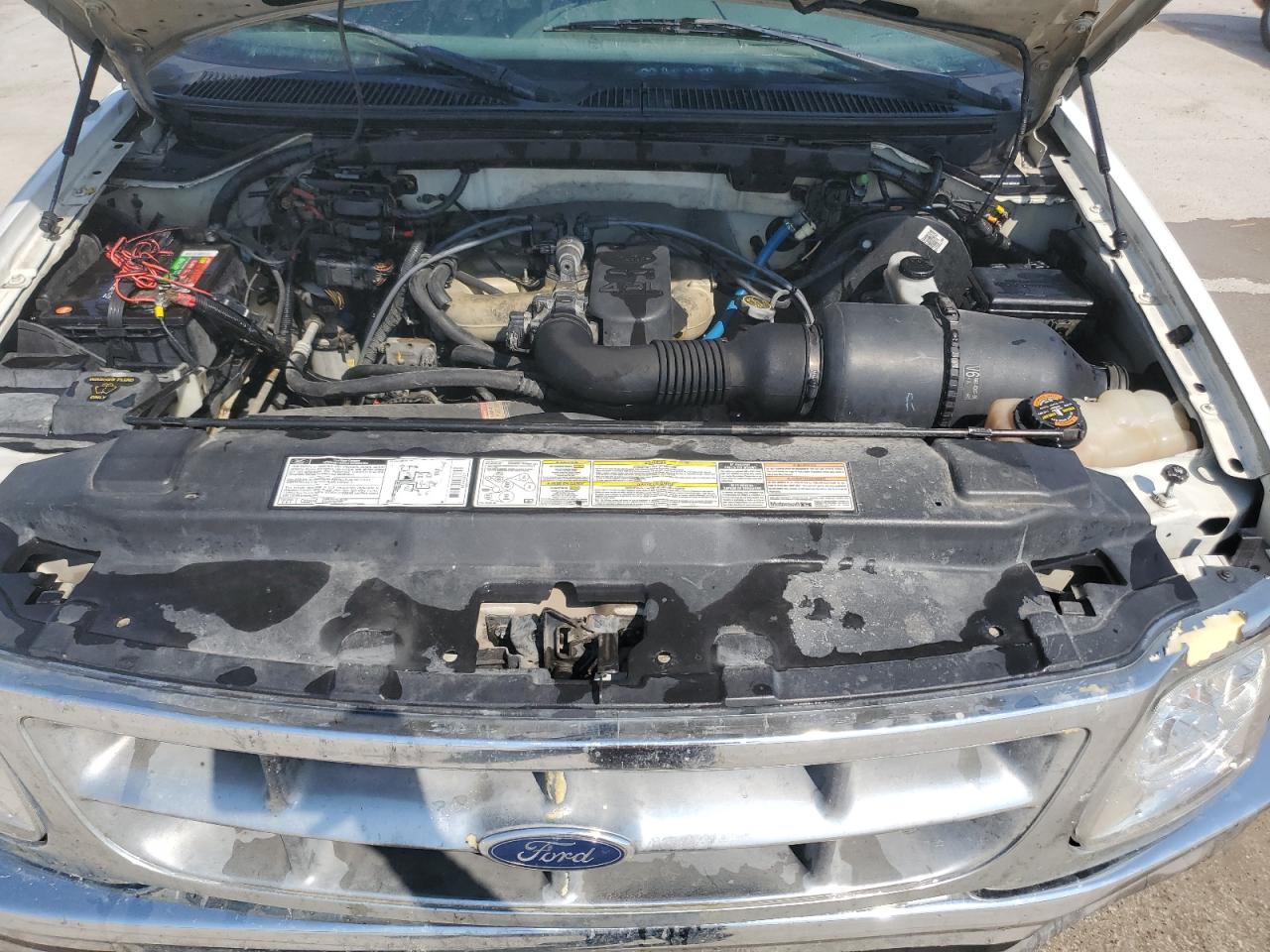 1998 Ford F-150 VIN 2FTZF1721WCA72751 Copart auction photo, front end damage thumbnail 11