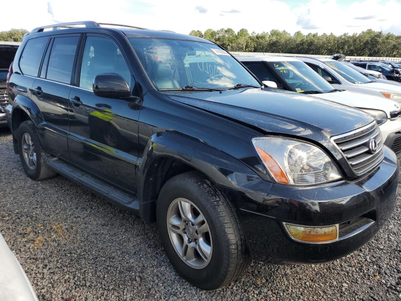 2005 Lexus GX VIN JTJBT20XX50074815 Copart auction photo, water/flood damage thumbnail 4