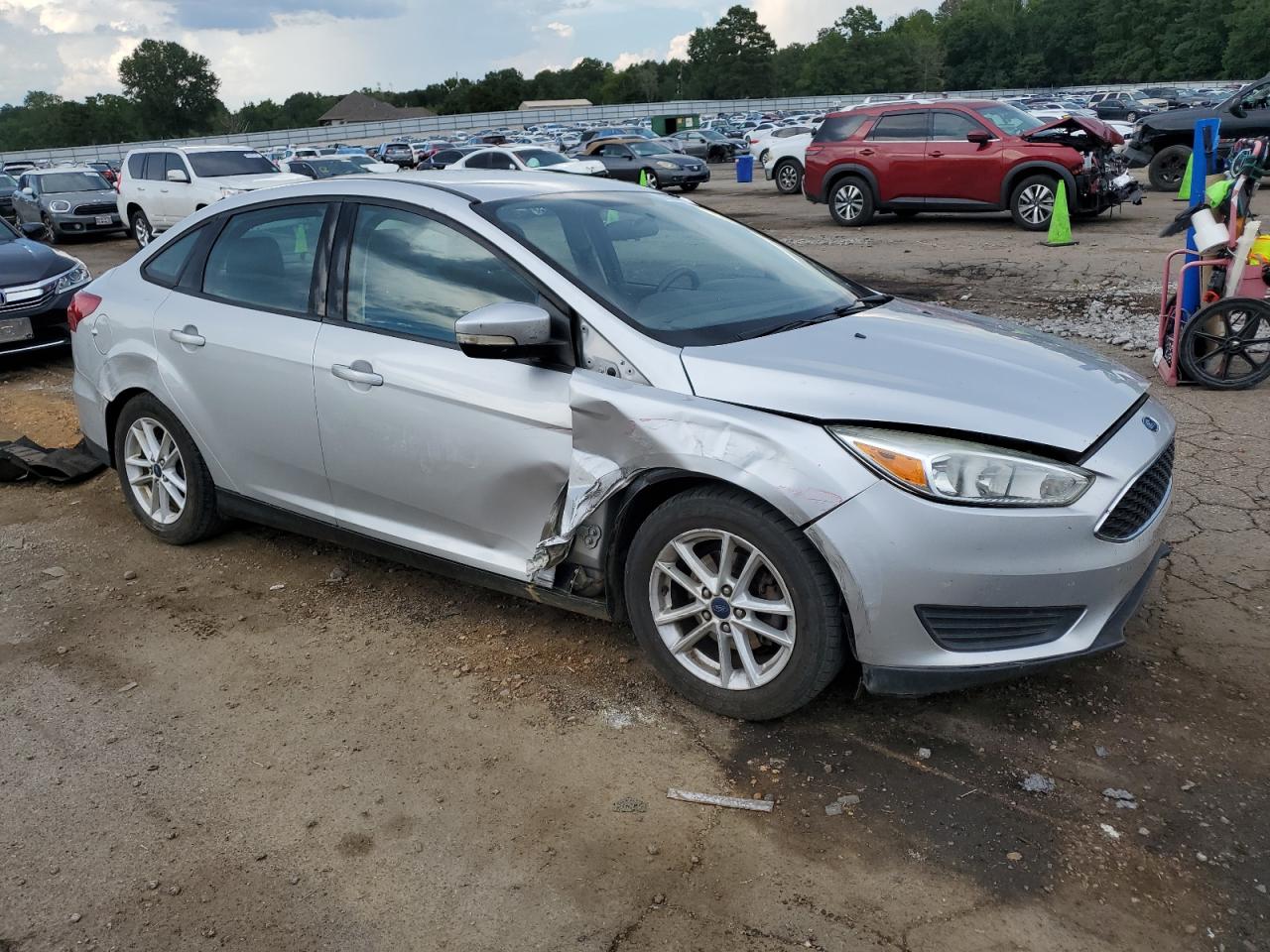 2016 Ford Focus VIN 1FADP3F24GL386556 Copart auction photo, side / front end damage thumbnail 4