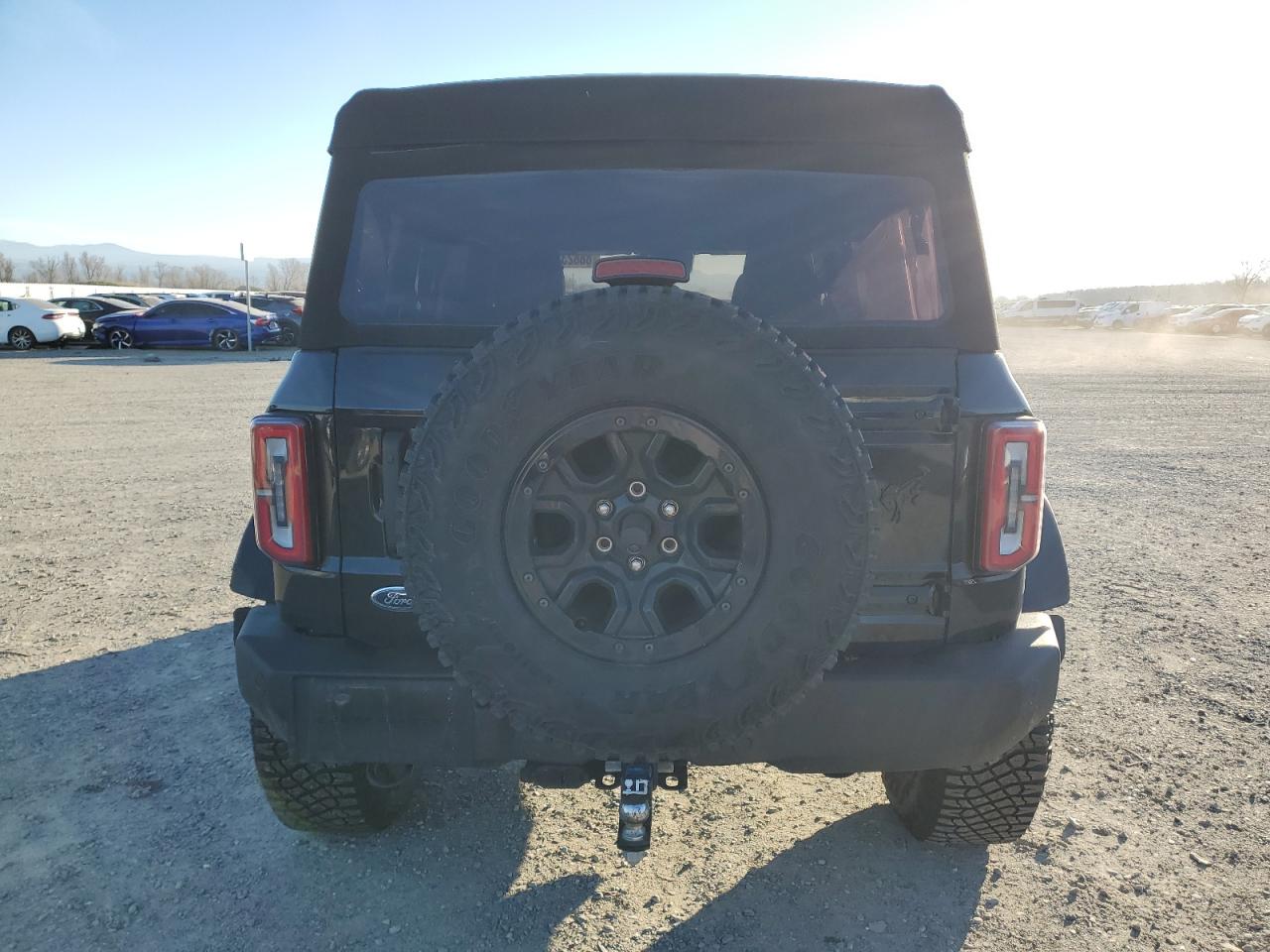 2023 Ford Bronco VIN 1FMEE5DP7PLB93490 Copart auction photo, front end / side damage thumbnail 6