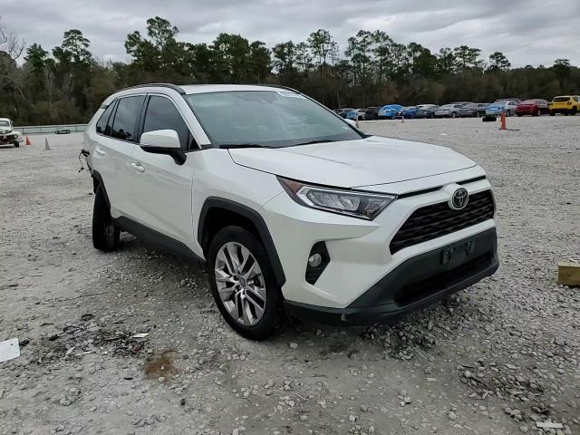 2021 Toyota RAV 4 VIN 2T3C1RFV9MW113917 Copart auction photo, side / rear end damage thumbnail 14