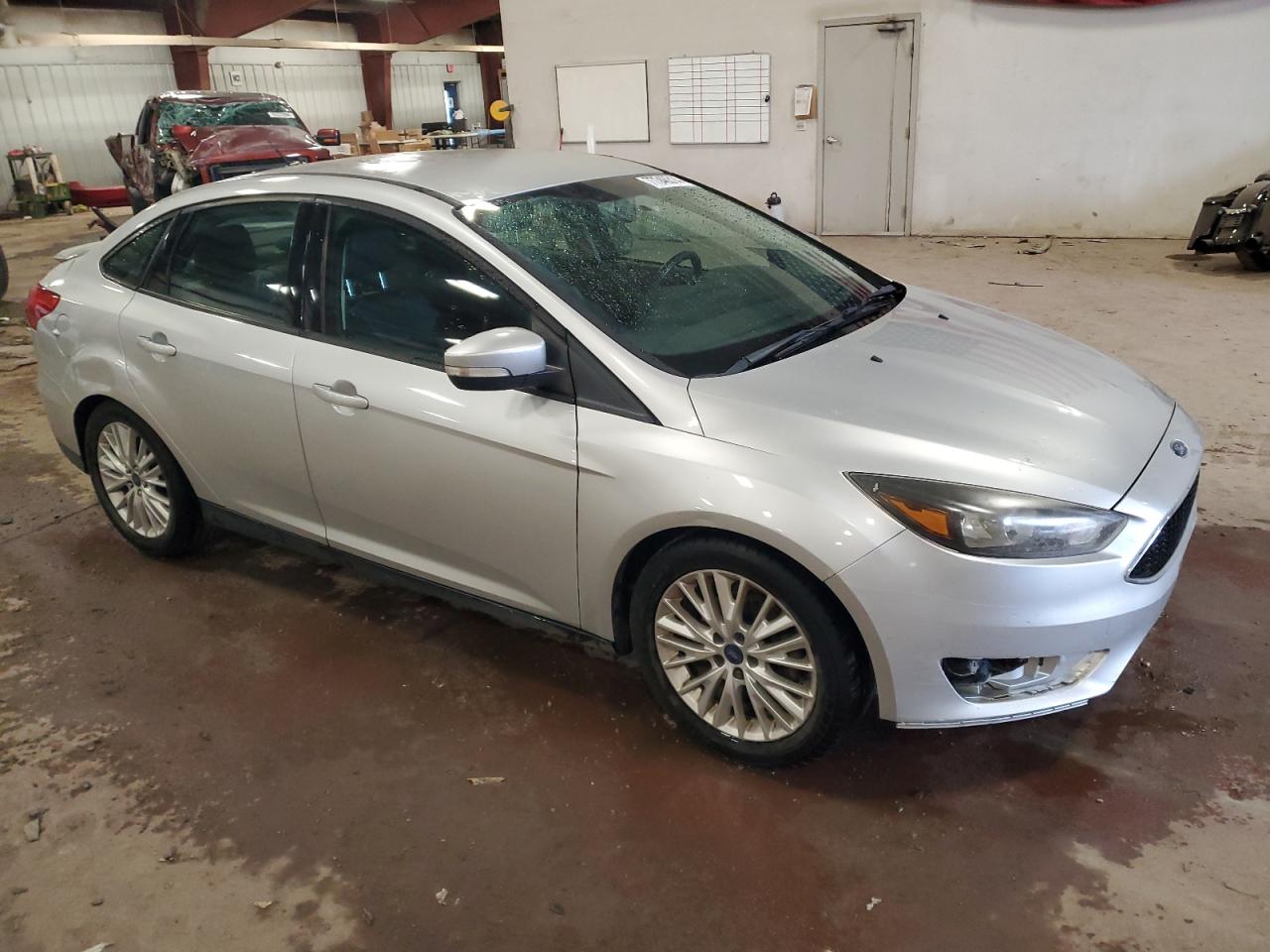 2015 Ford Focus VIN 1FADP3F27FL257029 Copart auction photo, front end damage thumbnail 4