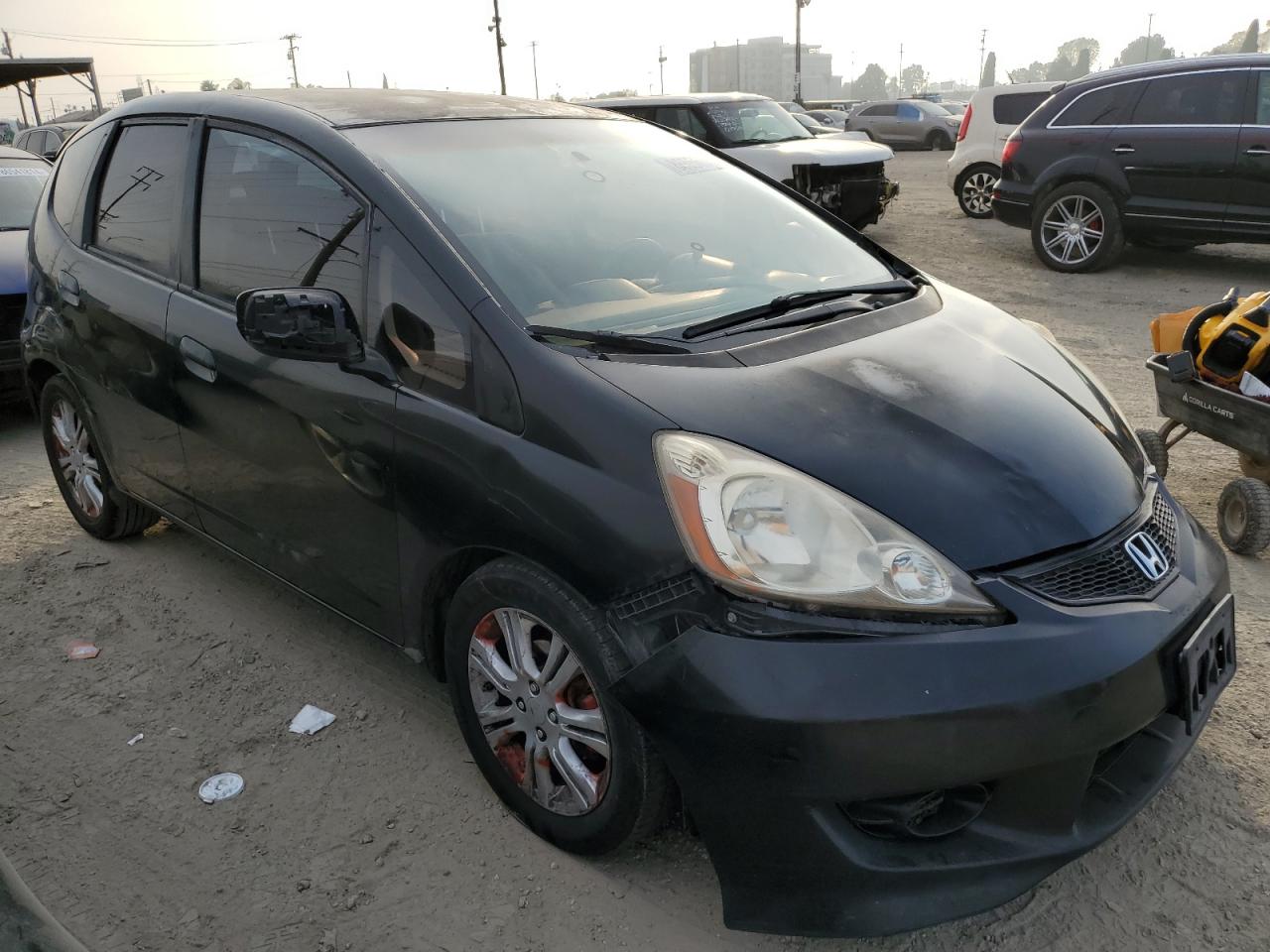 2010 Honda Fit VIN JHMGE8H60AC004345 Copart auction photo, all over damage thumbnail 4