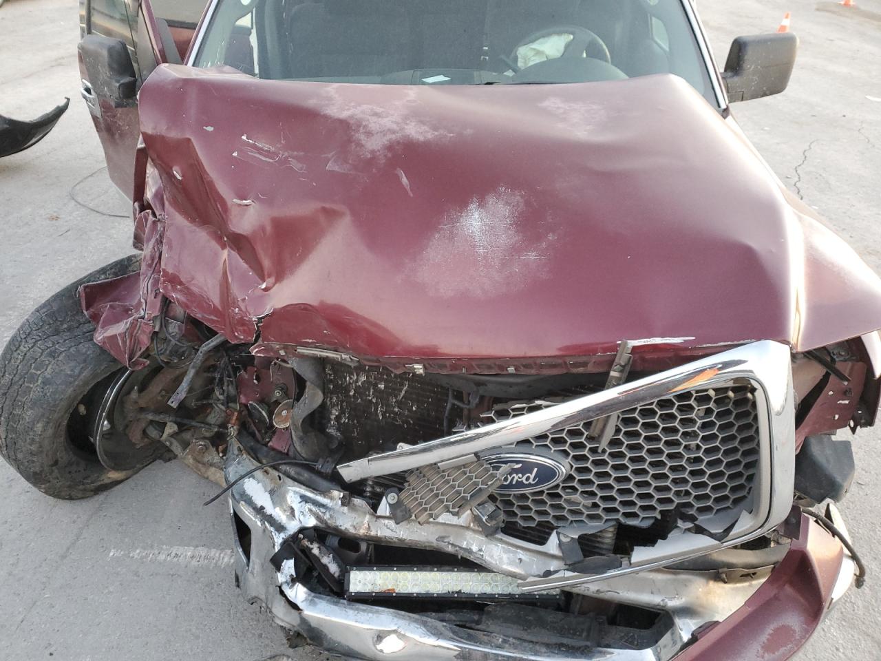2004 Ford F-150 VIN 1FTPW12574KD64079 Copart auction photo, front end damage thumbnail 12