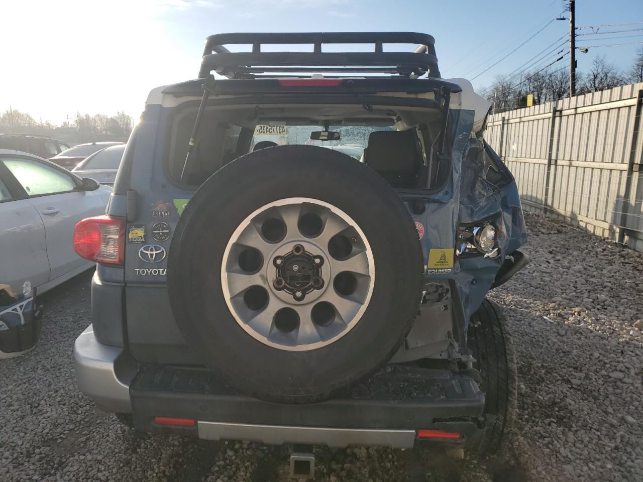 2011 Toyota FJ Cruiser VIN JTEBU4BF7BK099554 Copart auction photo, all over damage thumbnail 6